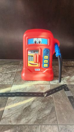Red Little Tikes Cozy coupe Pumper pretend play gas station toy.