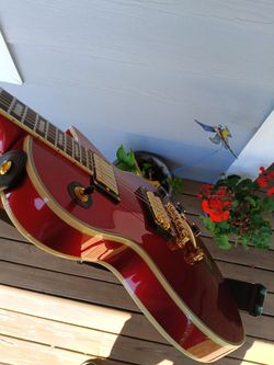 Firefly discontinued color with upgraded bridge humbucker and roller saddle tunomatic bridge