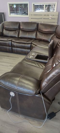 New sectional sofa with three power recliners on sale now