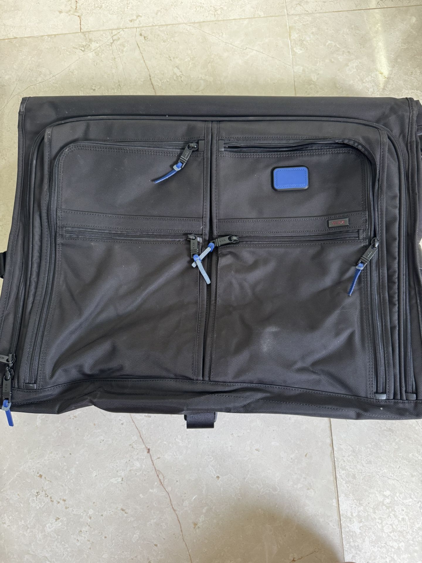 TUMI , Tri-Fold Carry-On suit