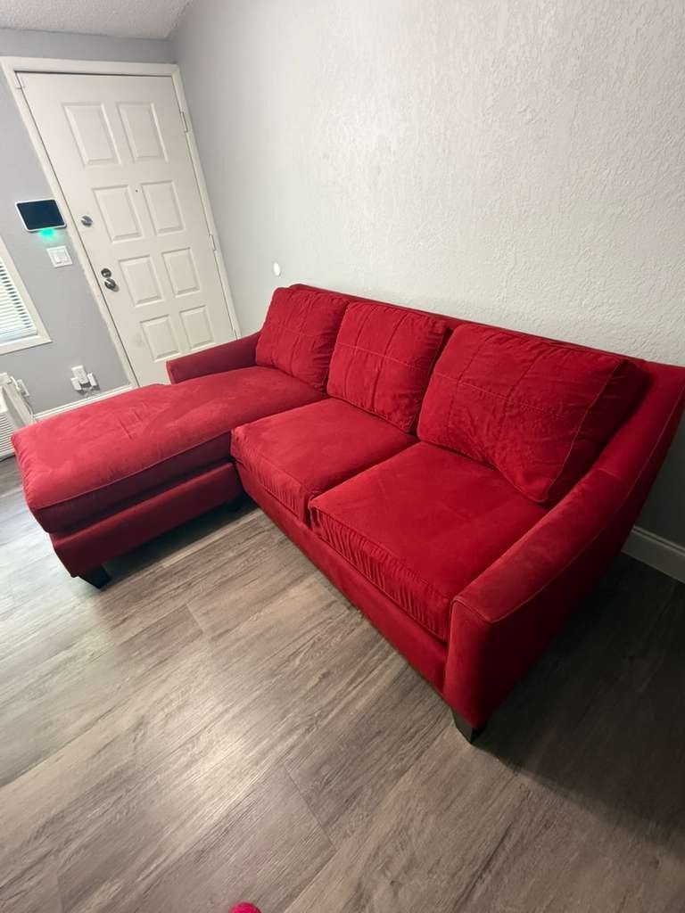 red sectional sofa with a chaise lounge