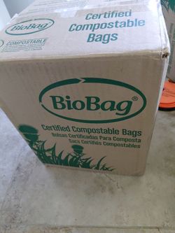 Brand new compost bin and compostable bags