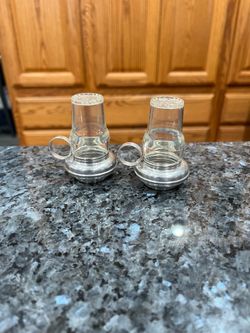 Vintage Metal With Plastic Lantern Pair of Salt and Pepper Shakers.  Brand new never used.  No box.  Size approximately 2 1/2 inches tall.