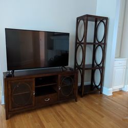 Entertainment center with two matching shelves