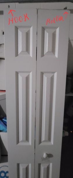 Primed Textured 6-Panel Hollow Core Composite Bi-fold Door