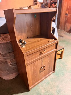 Vintage oak-finish laminate microwave cart