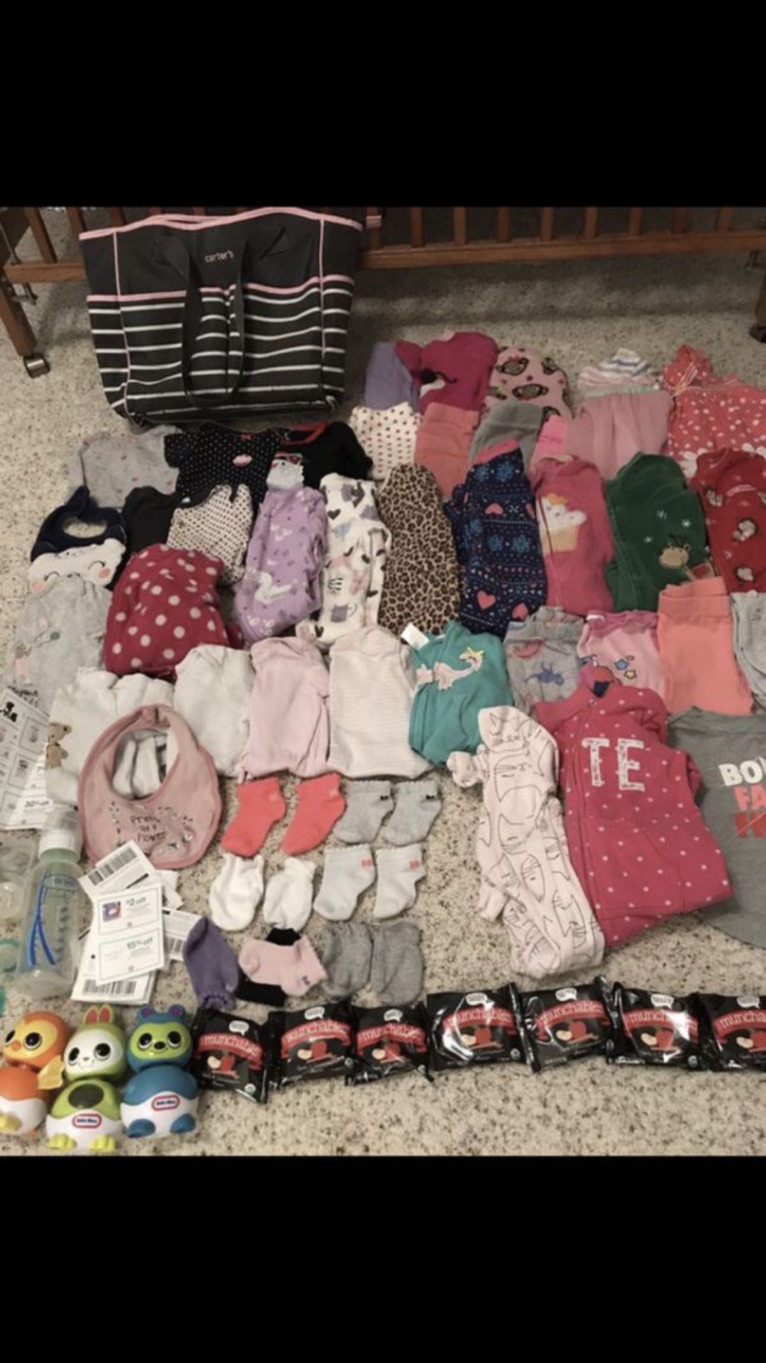 Carter’s 9-18month lot 9 sleepers 2 bibs 15 pants 2 jackets 11 onesies 5 shirts 1 sweat shirt (juicy couture) with matching pants 3 socks 2 mit