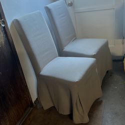 Slipcovered set of chairs