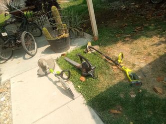 Two weed eater and blower