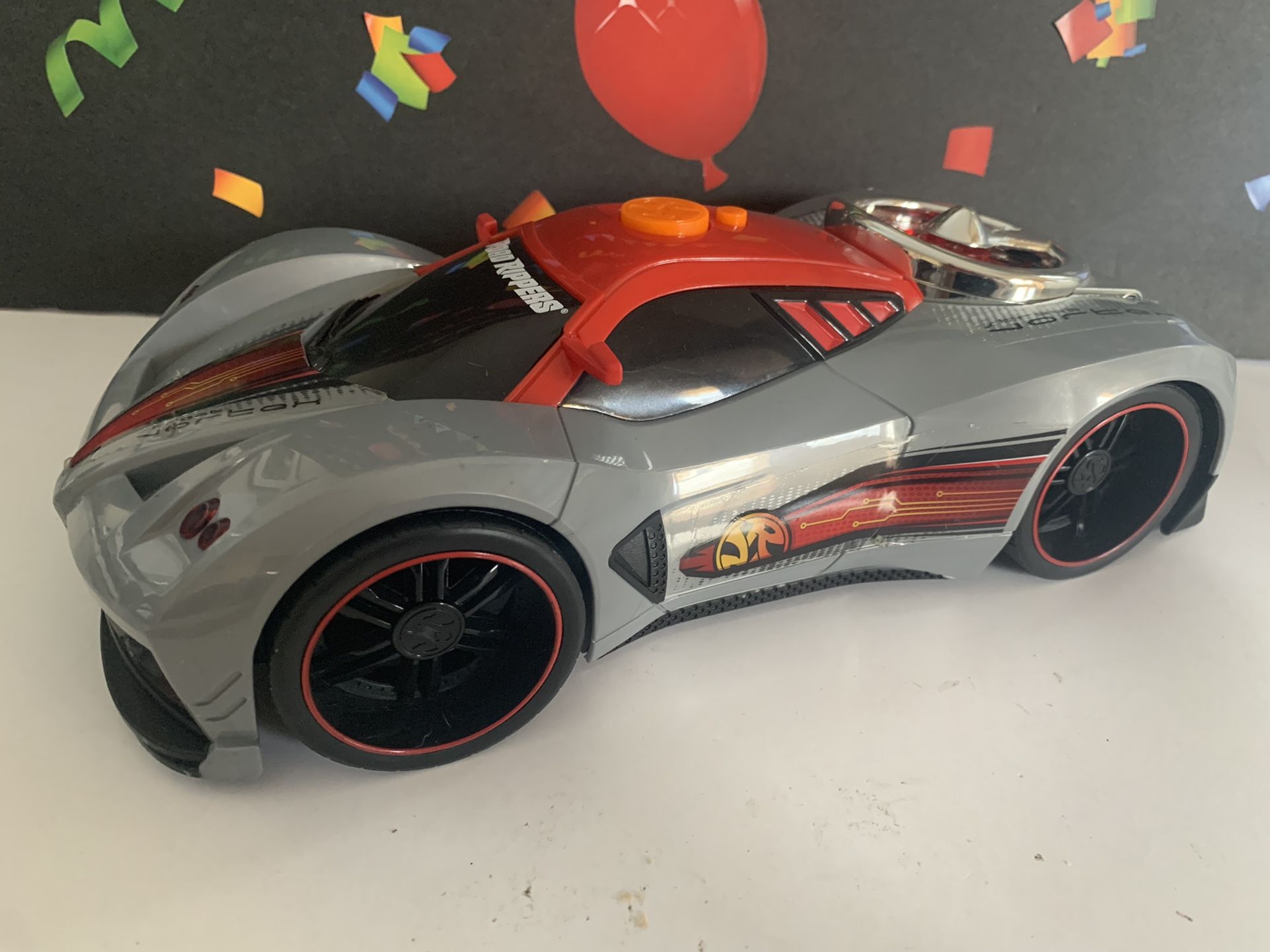 ROAD RIPPER DRAG CAR WITH TWO ACTION BUTTONS! LIGHTS UP AND TAKES OFF ! 11 INCHES