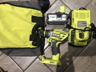 Brushless Ryobi hammer drill with 4.0 ah battery and fast charger