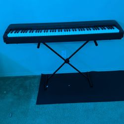 Brown Yamaha Keyboard/piano