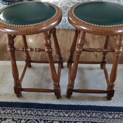 A Pair of Wood and Leather Stools