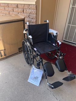 Wheelchair W/Elevated Footrests. NEW. Brakes, Sides Come Up.