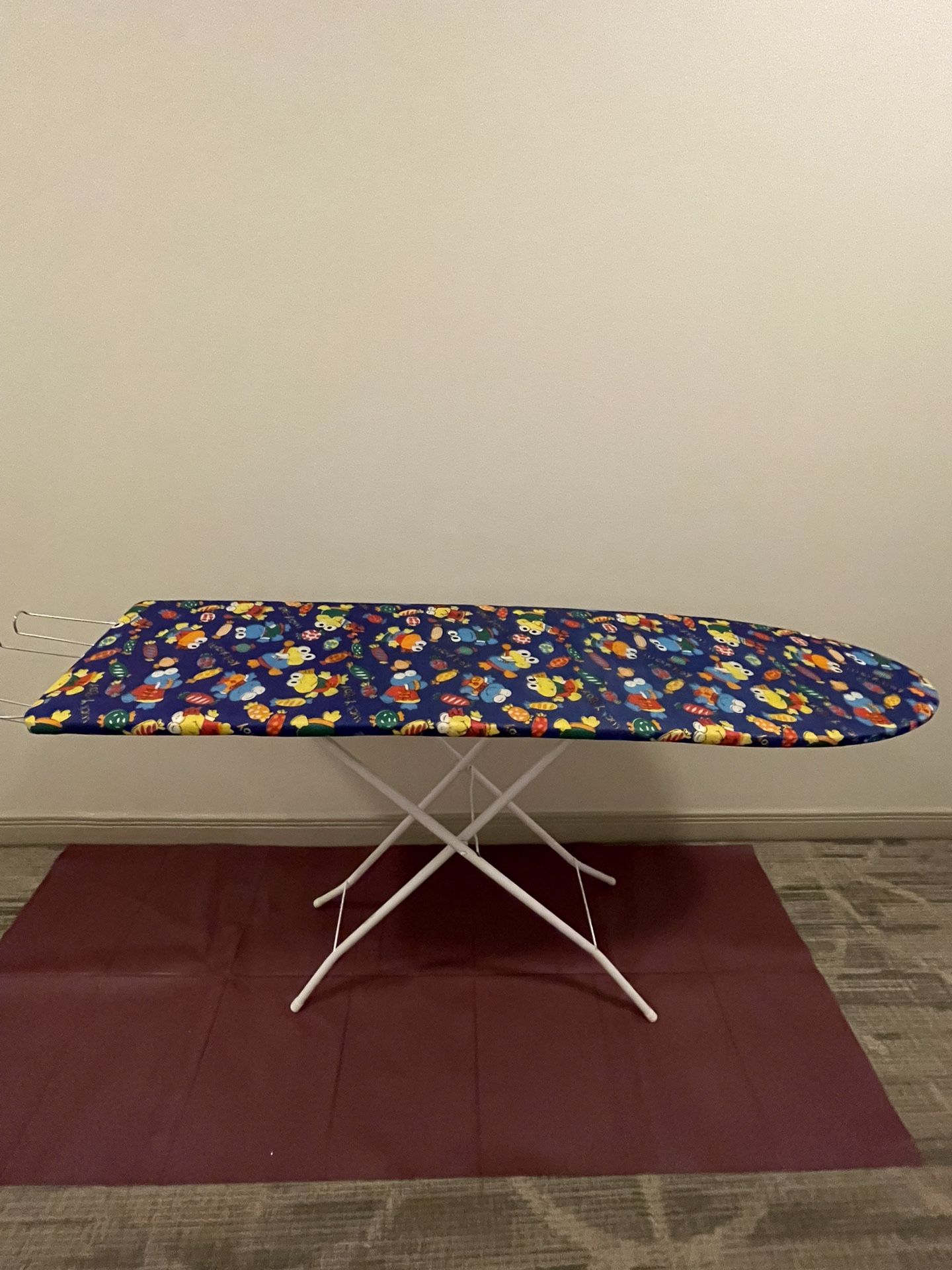 Mid-Size Ironing Board w/Attached “Lucky Boy” Cover & Pad plus attached PULL-OUT IRON CADDY - posted price is firm.