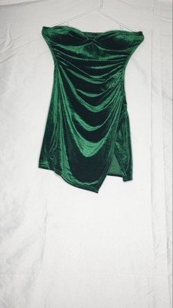 Woman’s dark green dress