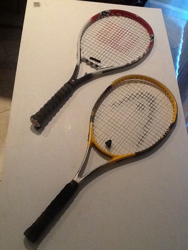 Pair of tennis Rackets (1) Wilson titanium (1) head carbon fiber