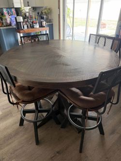 Counter height high top table with 4 chairs