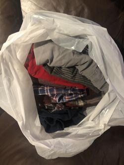 Bag full of Men’s size L and XL shirts