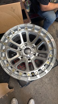 New rims  AXD chrome 17x9 6x139 on new tires