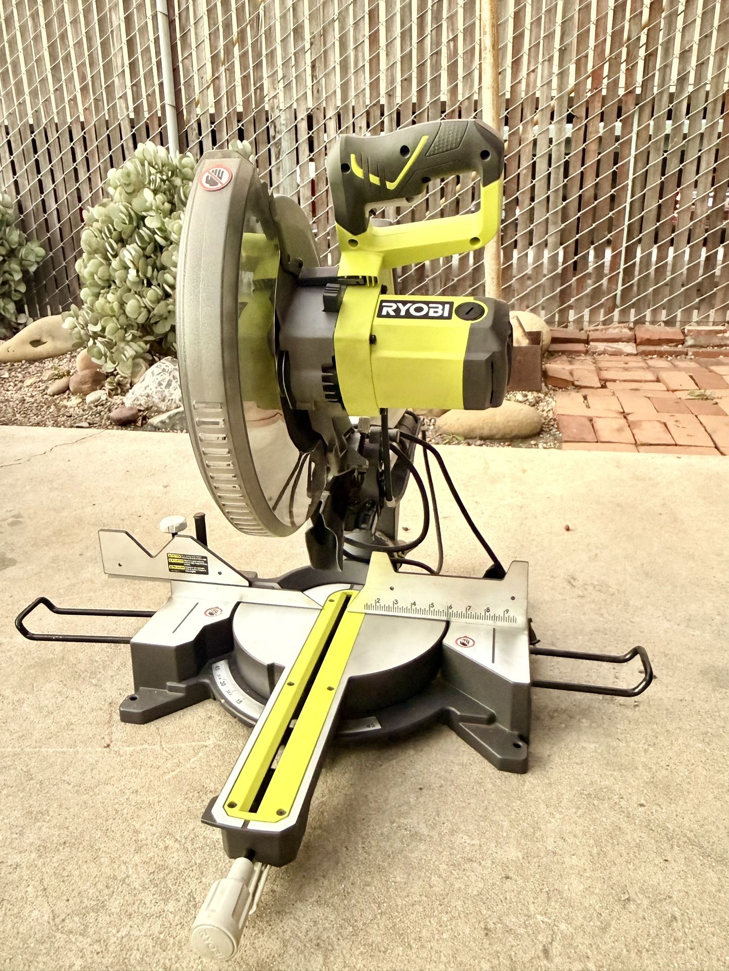 RYOBI Model TSS121 15 Amp 12 in. Corded Sliding Compound Miter Saw (Like New)