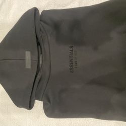 fear of god essentials black hoodie