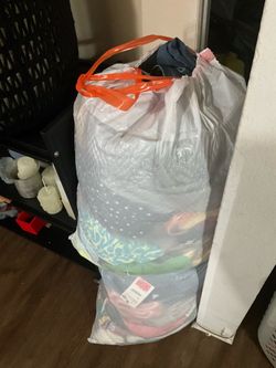 2 hefty bags full of clothes(womens)