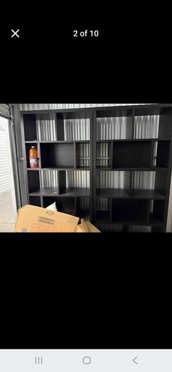 Two Mainstays 12-Cube Square Shelf Bookcase.