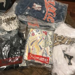 Supreme SS 24” Week 15 Trucker Jacket, Printed Paisley Sweater, Big Script Mesh Short, Camp Cap; 6 Panel