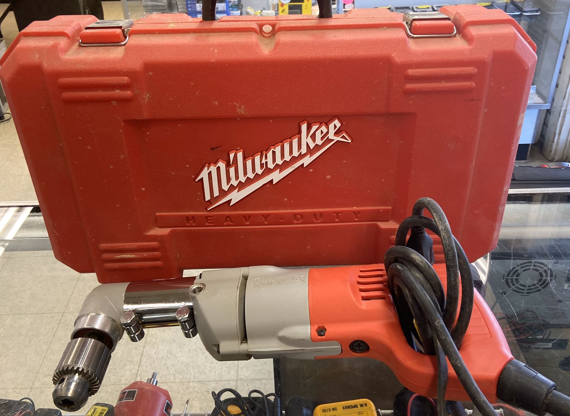 Milwaukee tools universal drill with case and handle
