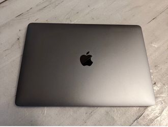 MacBook charger included