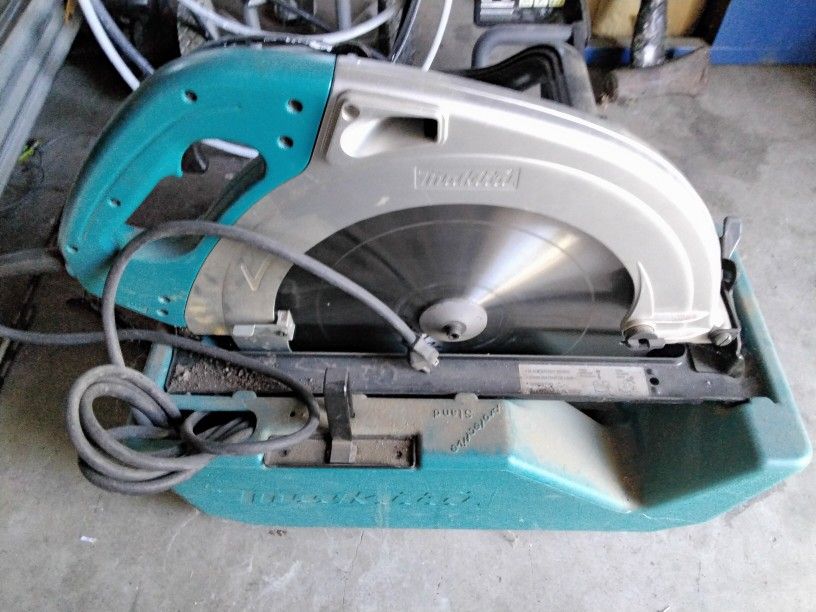 MAKITA 16 1/4 " BEAM SAW. USED ONCE