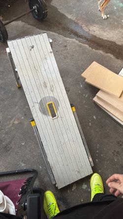 a Gorilla Ladders Aluminum Slim-Fold Work Platform.