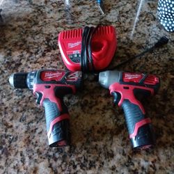 2 Milwaukee M12 Drills With Batteries And Charger 