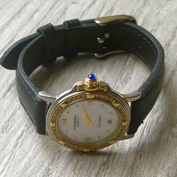Woman’s Solid 18k Gold & Stainless + Diamonds Swiss Watch