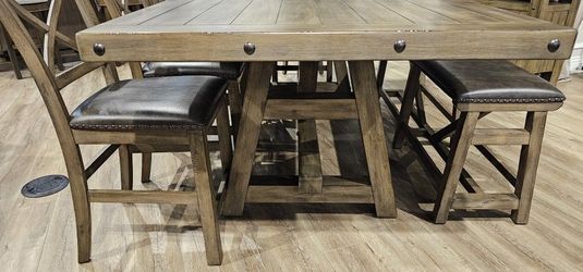 8 Pc. Extendable Counter Height Dining Table Set. While supplies LAST!