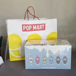POP MART Labubu The Monsters Exciting Macaron blind box series. 