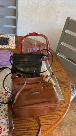 Eastside, all together for $7.00,,, two leather purses and a plastic bag