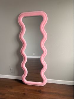 Pink wavy mirror