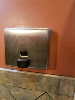 Bobrick Conturaseries B-4112 surface mounted soap dispenser
