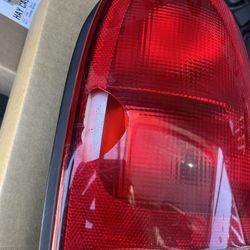 used 1999 Plymouth Voyager tail light,