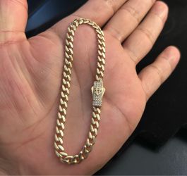 Bracelet type Monaco 14 k real gold