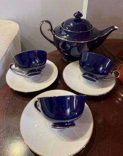 Teavana teapot and teacups saucers