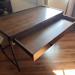 Brown Desk With Black Piping