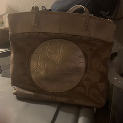Tan coach purse