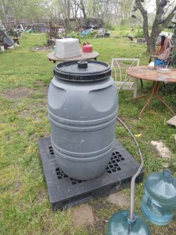 Waterboro With Screw-on Lid And Smaller Screw Up Made Also Plastic Pallet I Mean