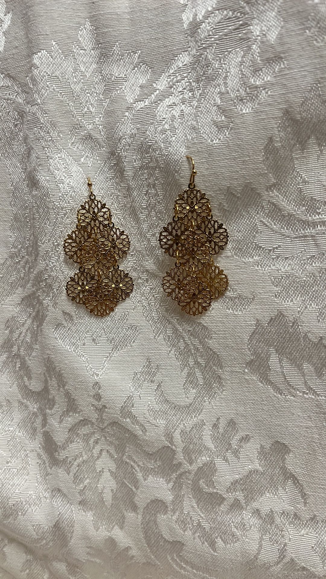 Gold tone costume pierced earrings