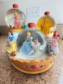 Antique Disney princess snow globe