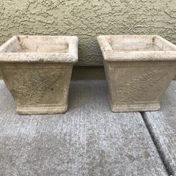 2 cute cement planters 