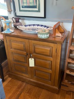 Beautiful vintage wood cabinet with great storage space
